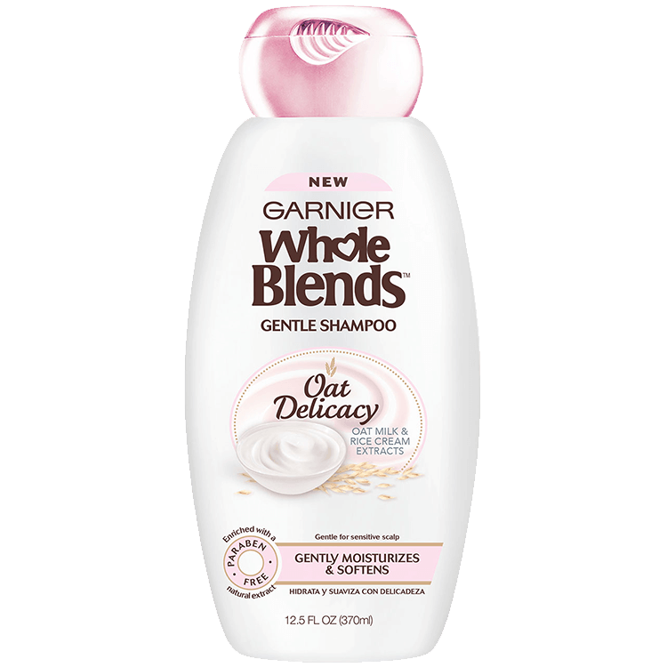 Front view of Garnier Whole Blends Oat Delicacy Shampoo with the Allure Best of Beauty Award badge.